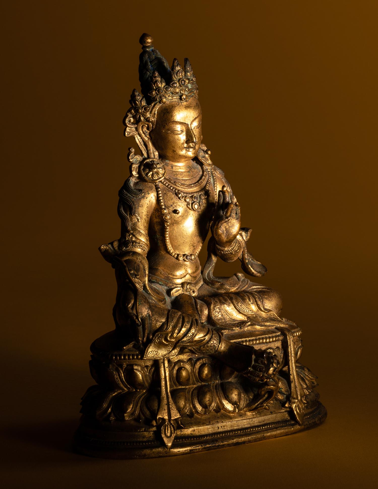 A Sino-Tibetan Gilt Bronze Figure of Seated Tara