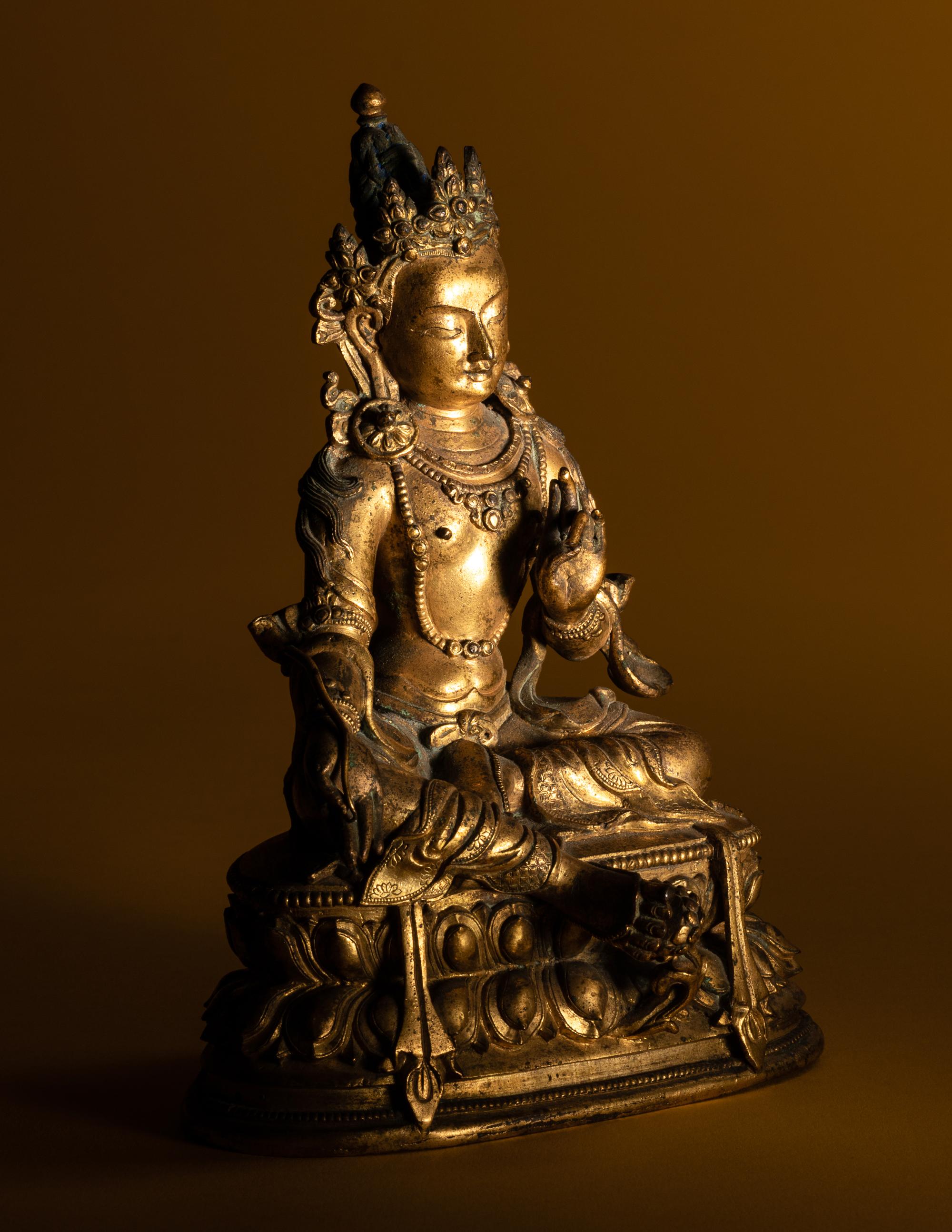 A Sino-Tibetan Gilt Bronze Figure of Seated Tara