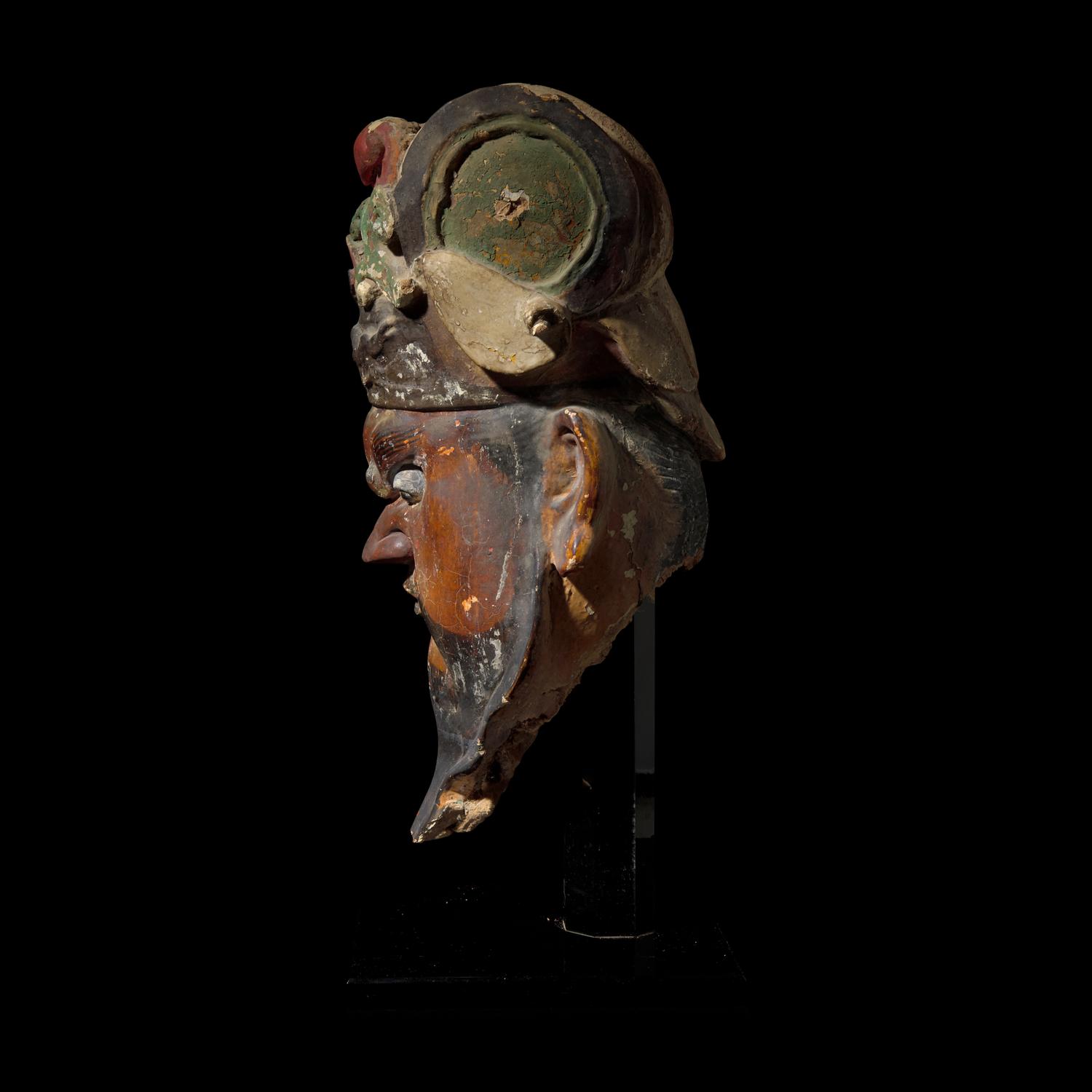 A Chinese Polychromed Stucco Head of a Celestial Judge, Ming Dynasty 明 彩繪泥塑天王首
