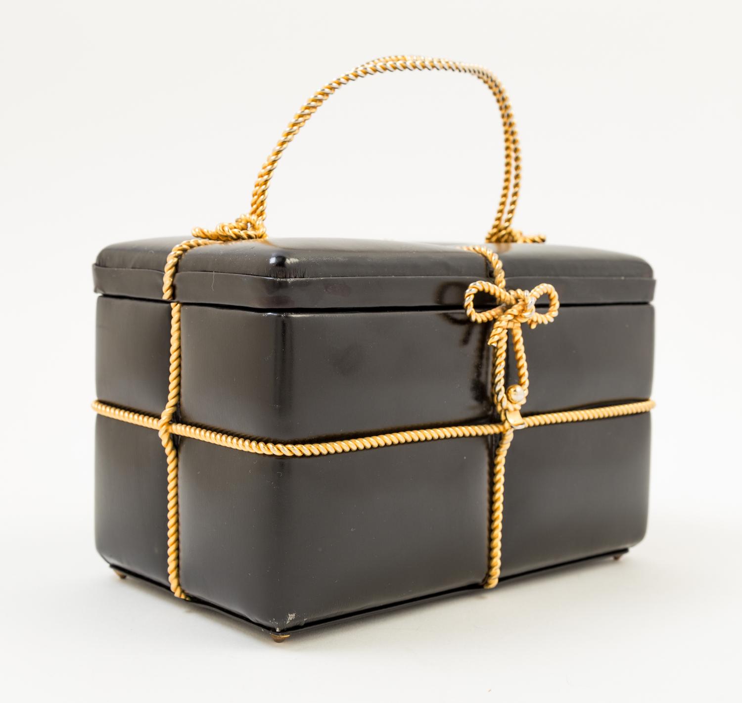 A Judith Leiber Black Leather Gift Box Handbag, 7.5" x 4.5" x 4.5"; Handle drop: 3".