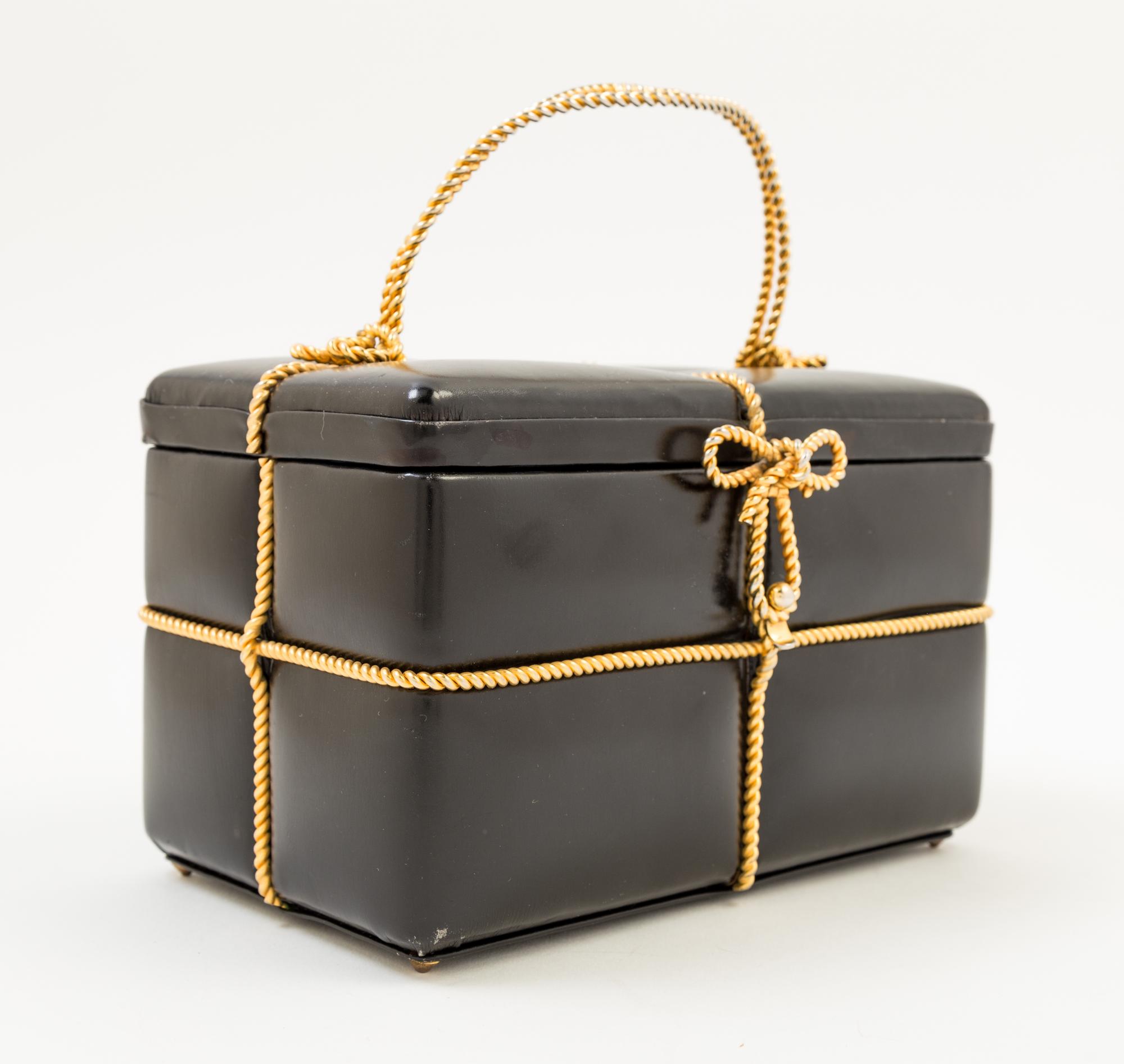 A Judith Leiber Black Leather Gift Box Handbag, 7.5" x 4.5" x 4.5"; Handle drop: 3".