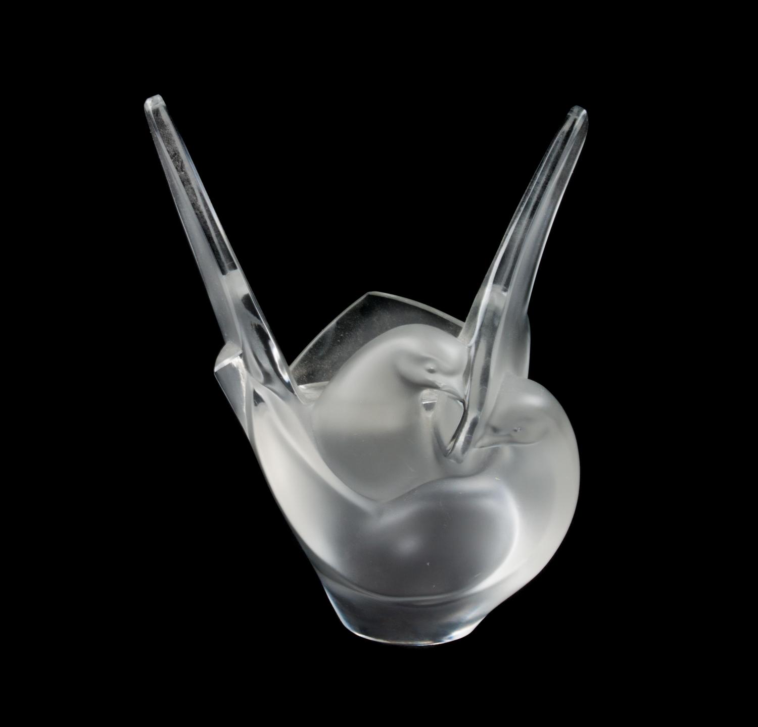 A Lalique Molded and Frosted Glass Vase Height 8 1/2 inches.