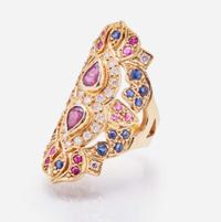 An 18K Yellow Gold and Gemstone Ring