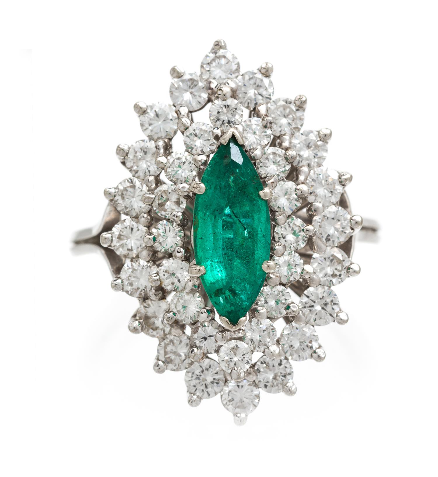 A 14 Karat White Gold, Emerald and Diamond Cocktail Ring, 5.40 dwts.