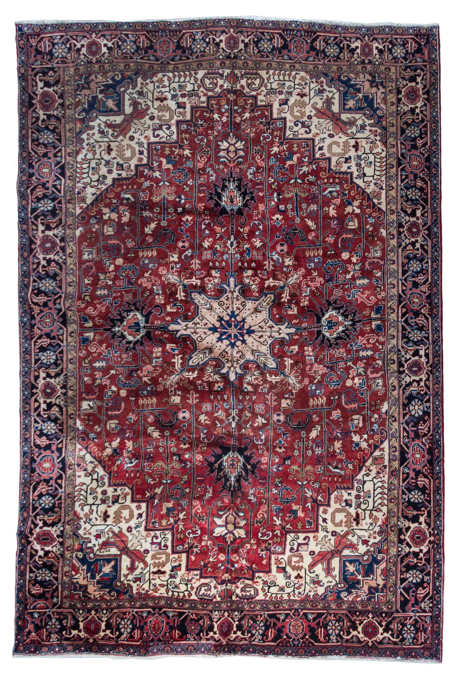 A Heriz Wool Rug 11 feet 8 inches x 7 feet 11 inches.