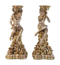 A Pair of Monumental Italian Baroque Style Gilt and Silvered Composition Figural Pedestals