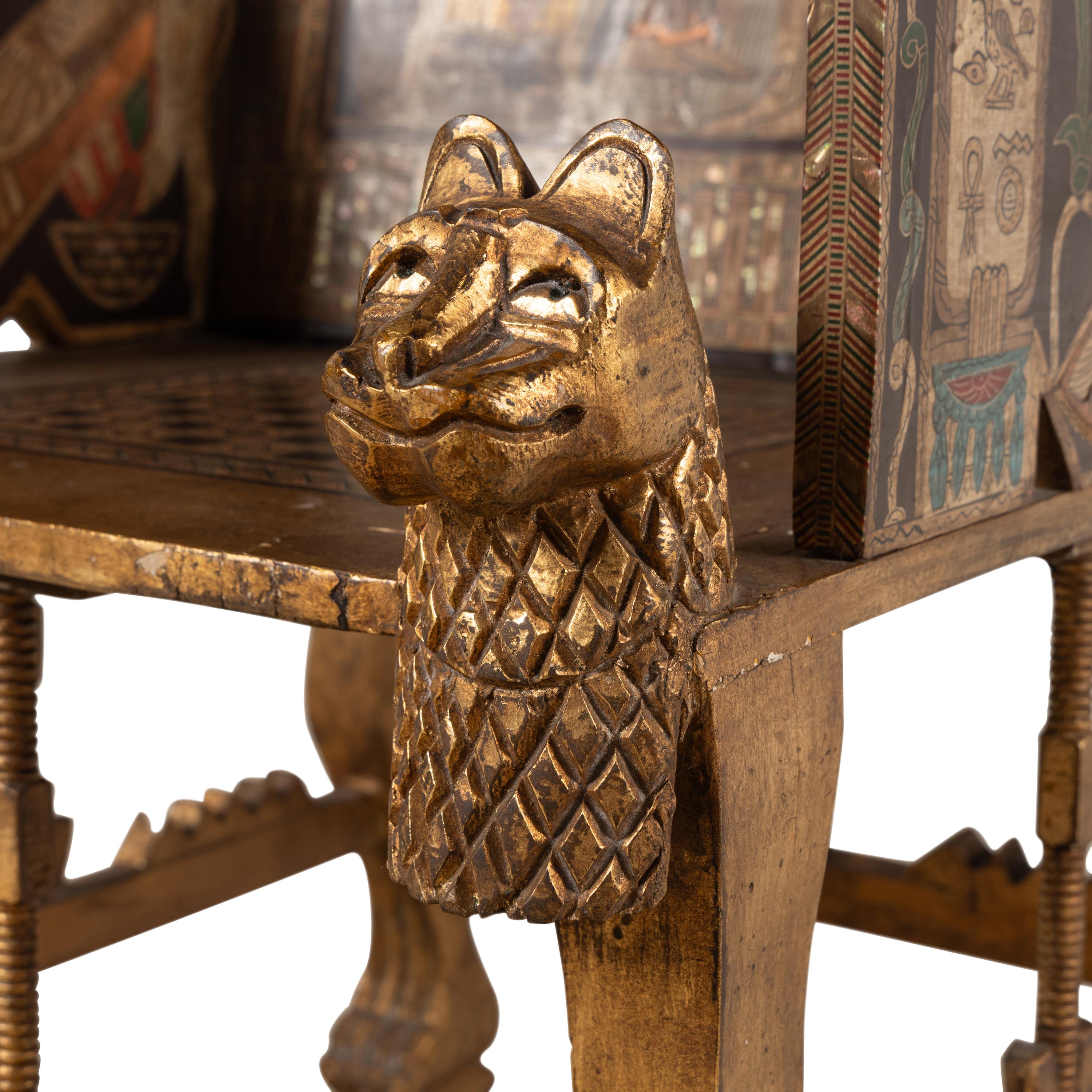 An Egyptian Style Polychrome-Painted and Giltwood Throne Chair
