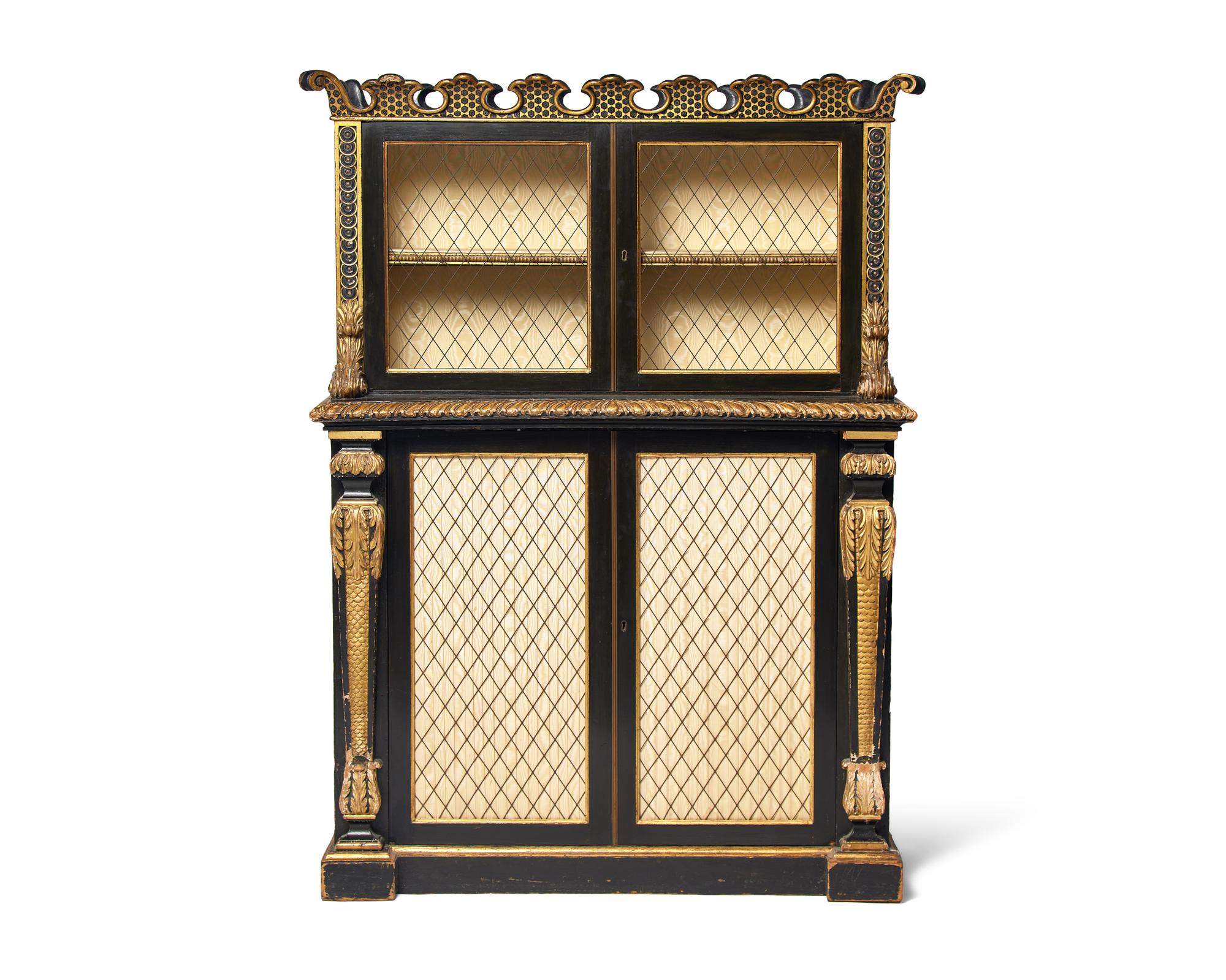 A Continental Ebonized and Parcel Gilt Bookcase