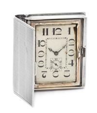 A French Silver Travel Clock, Georges Meyer, First Half 20th Century, in the form of a book, opening to a rectangular dial with Arabic