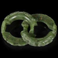 A Chinese spinach jade double ring 碧玉御题诗蚩尤环