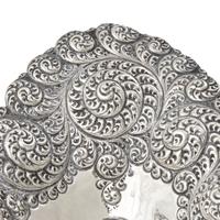 An American Aesthetic Movement Silver Repousse Bread Dish