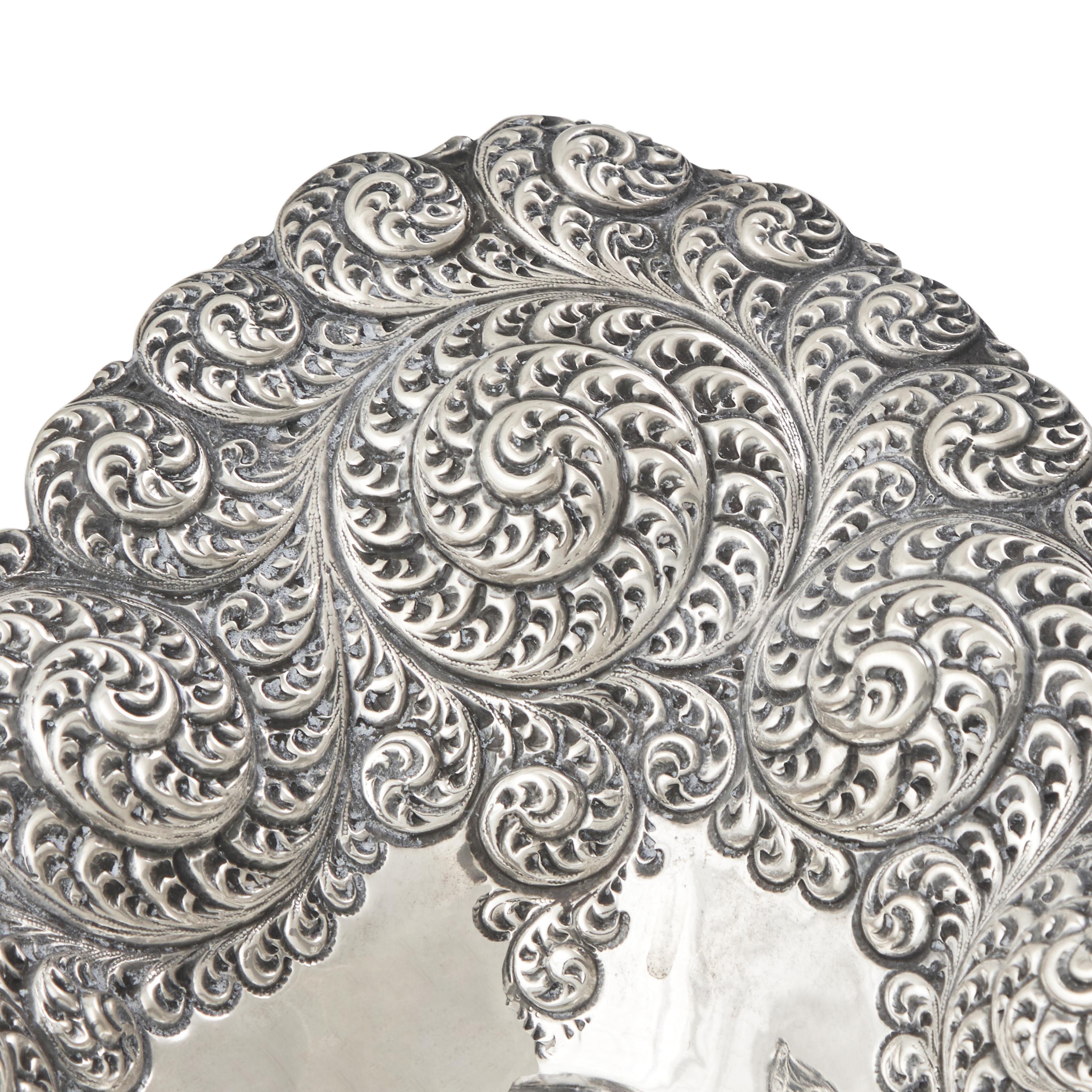 An American Aesthetic Movement Silver Repousse Bread Dish