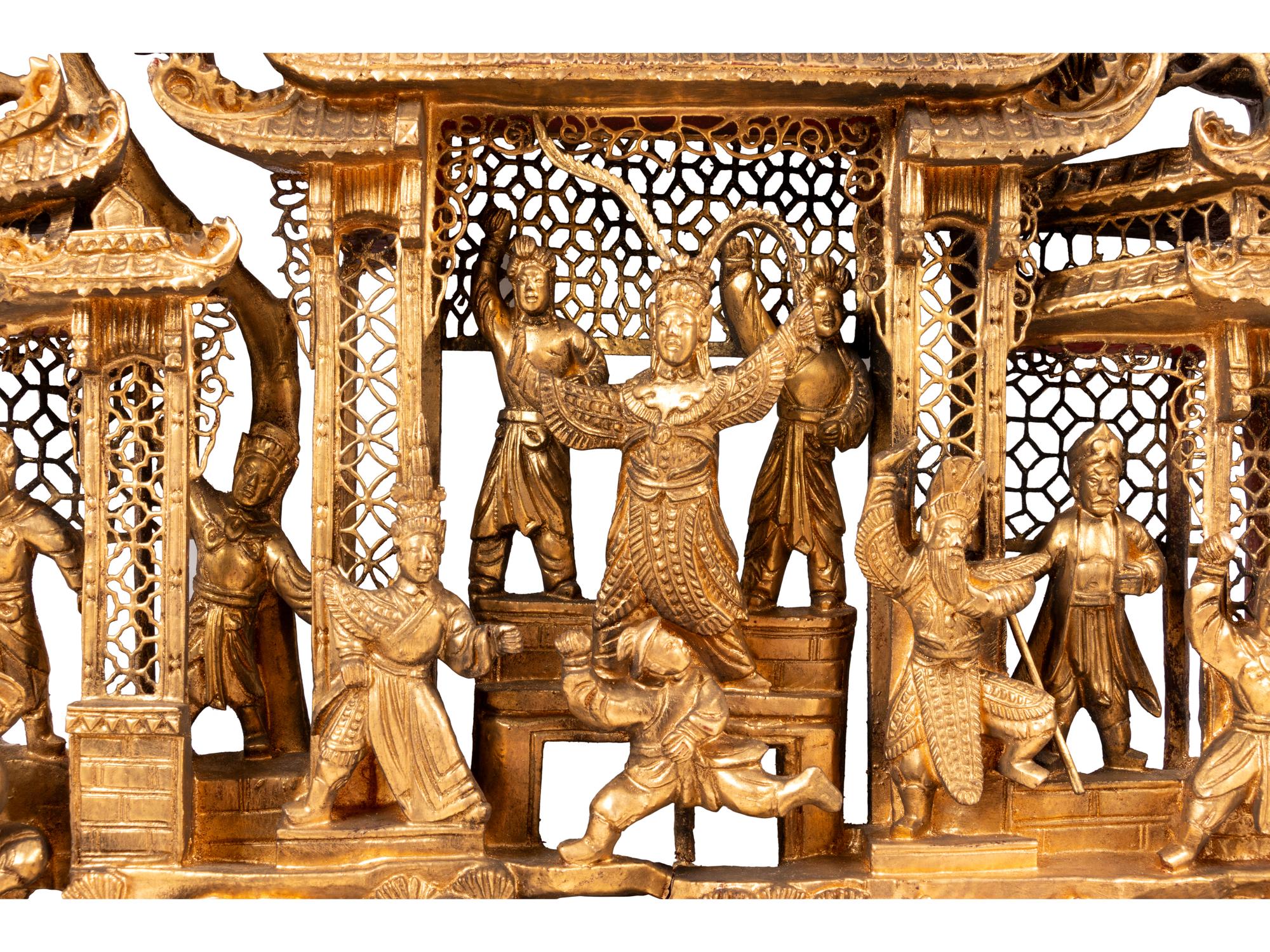 A Chinese Red Lacquer and Gilt Decorated Carved Wood Panel