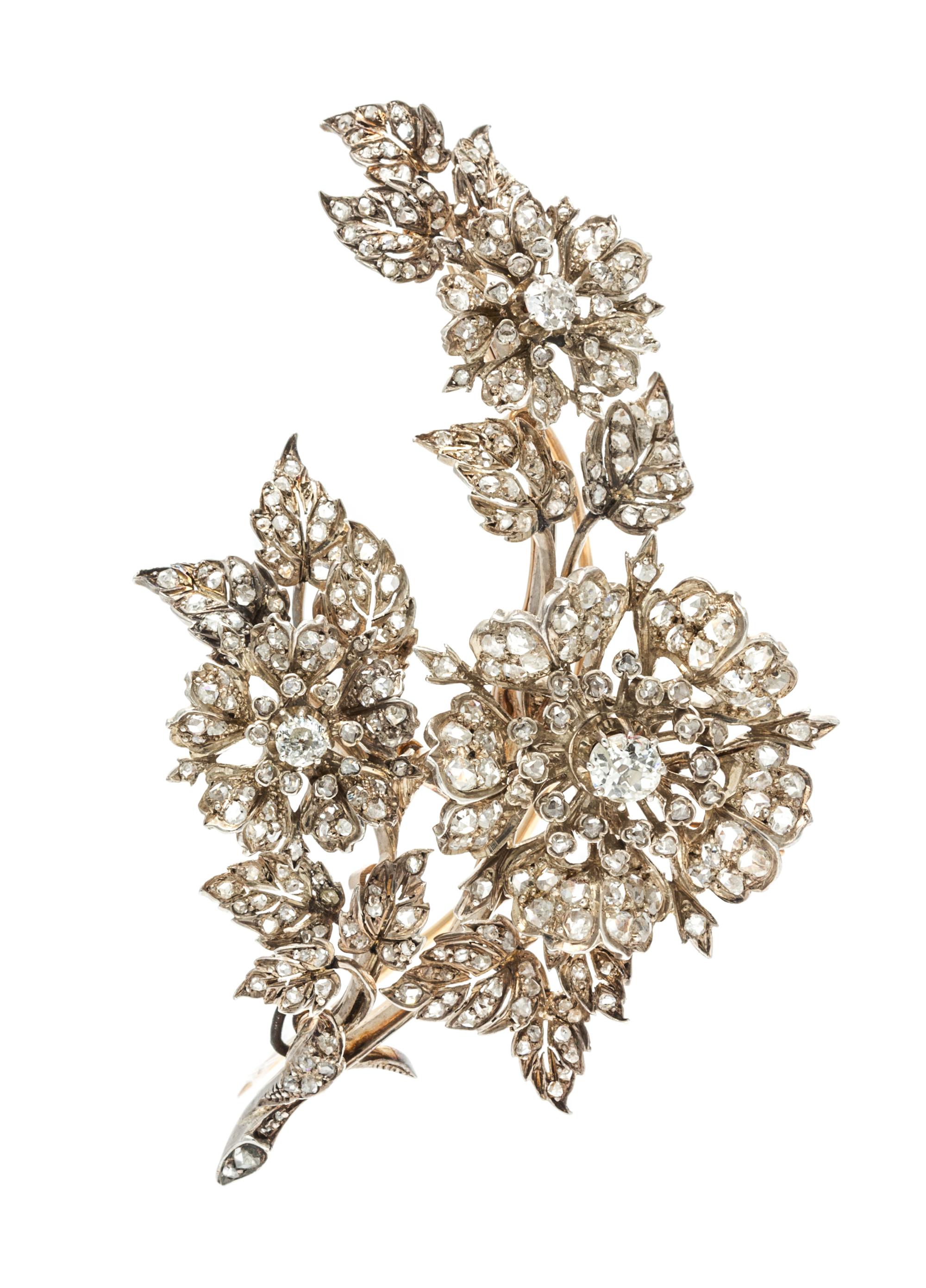 A Belle Epoque Silver Topped Gold and Diamond En Tremblant Floral Brooch, Caillot, Peck & Guillemin Freres, Paris, 32.40 dwts.