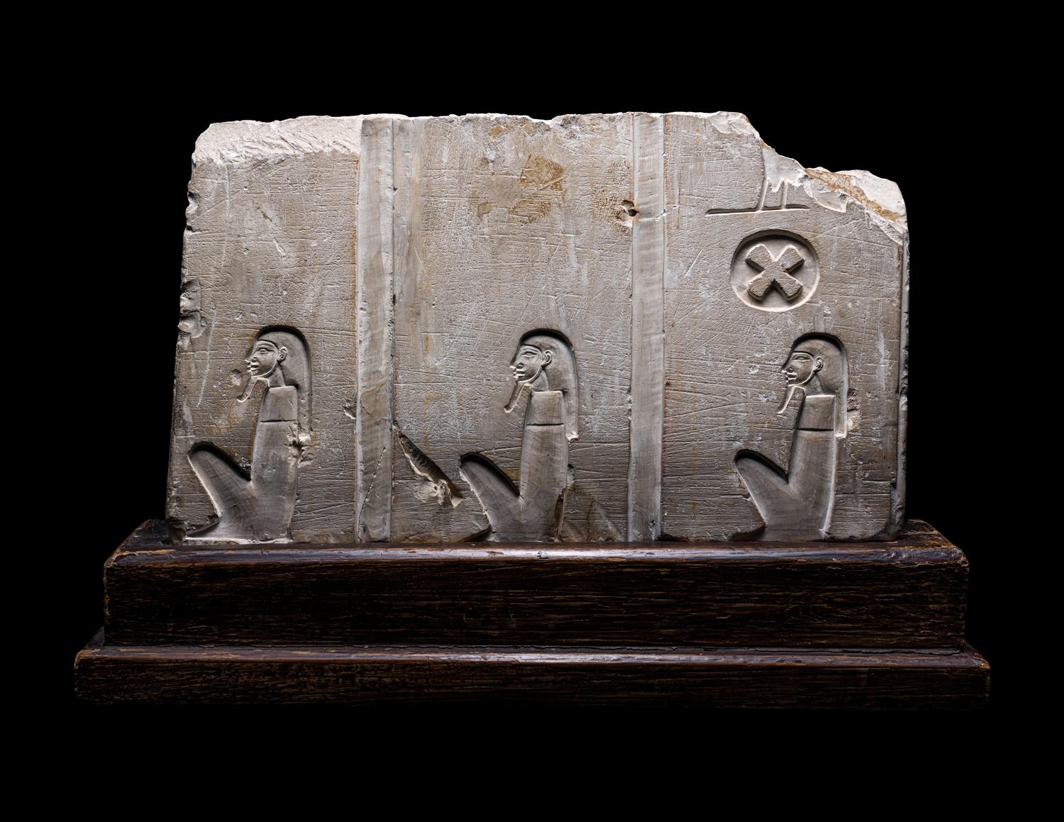 An Egyptian Limestone Relief Fragment