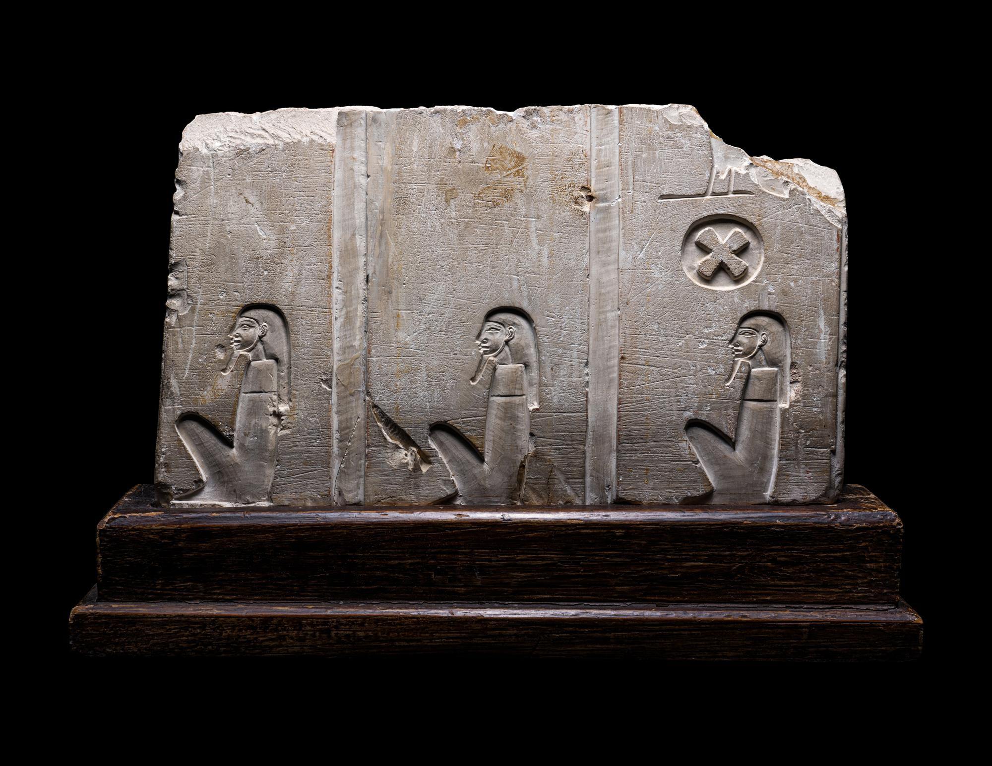 An Egyptian Limestone Relief Fragment