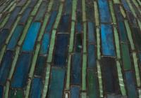 A Leaded Glass and Bronze Table Lamp