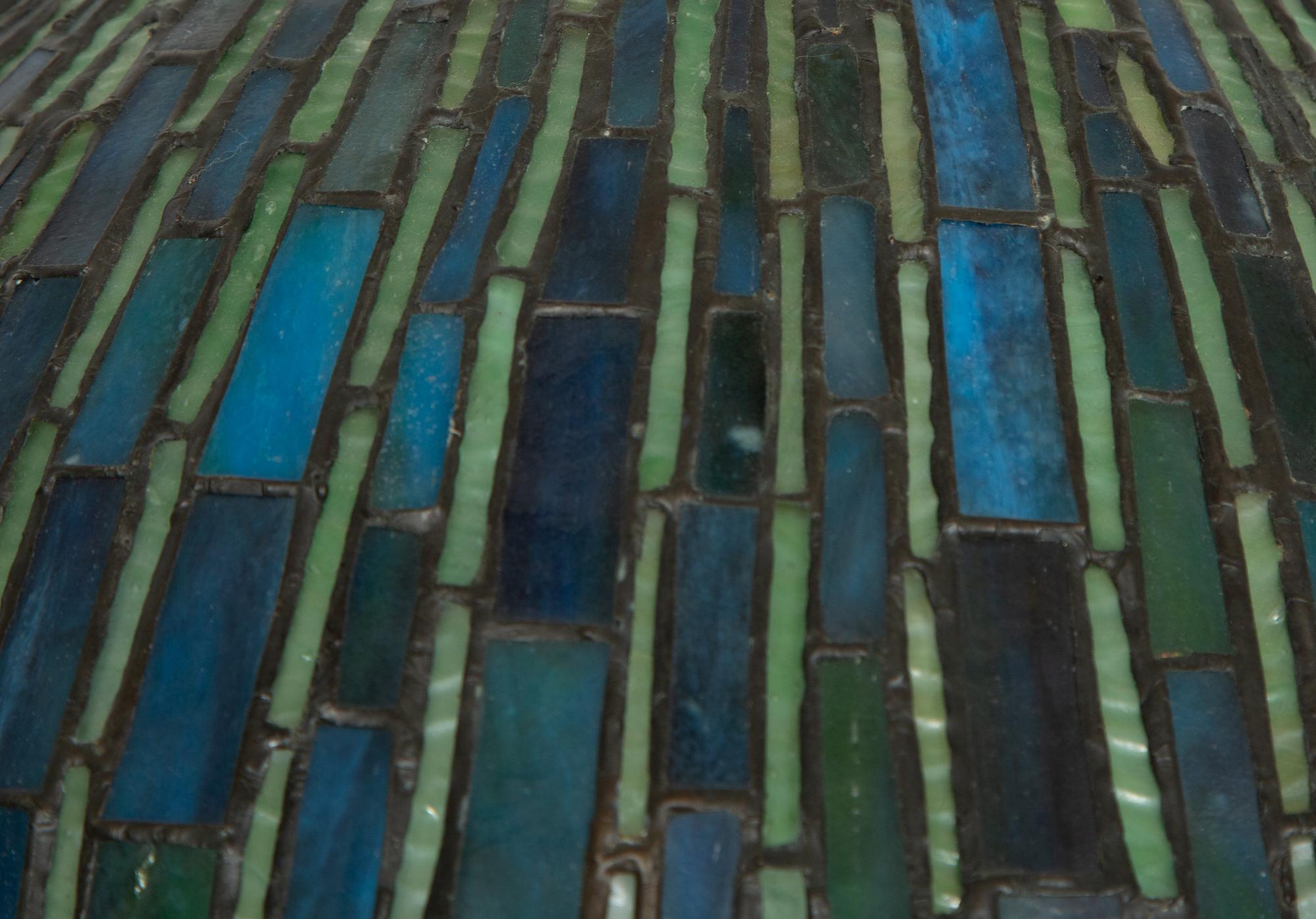 A Leaded Glass and Bronze Table Lamp