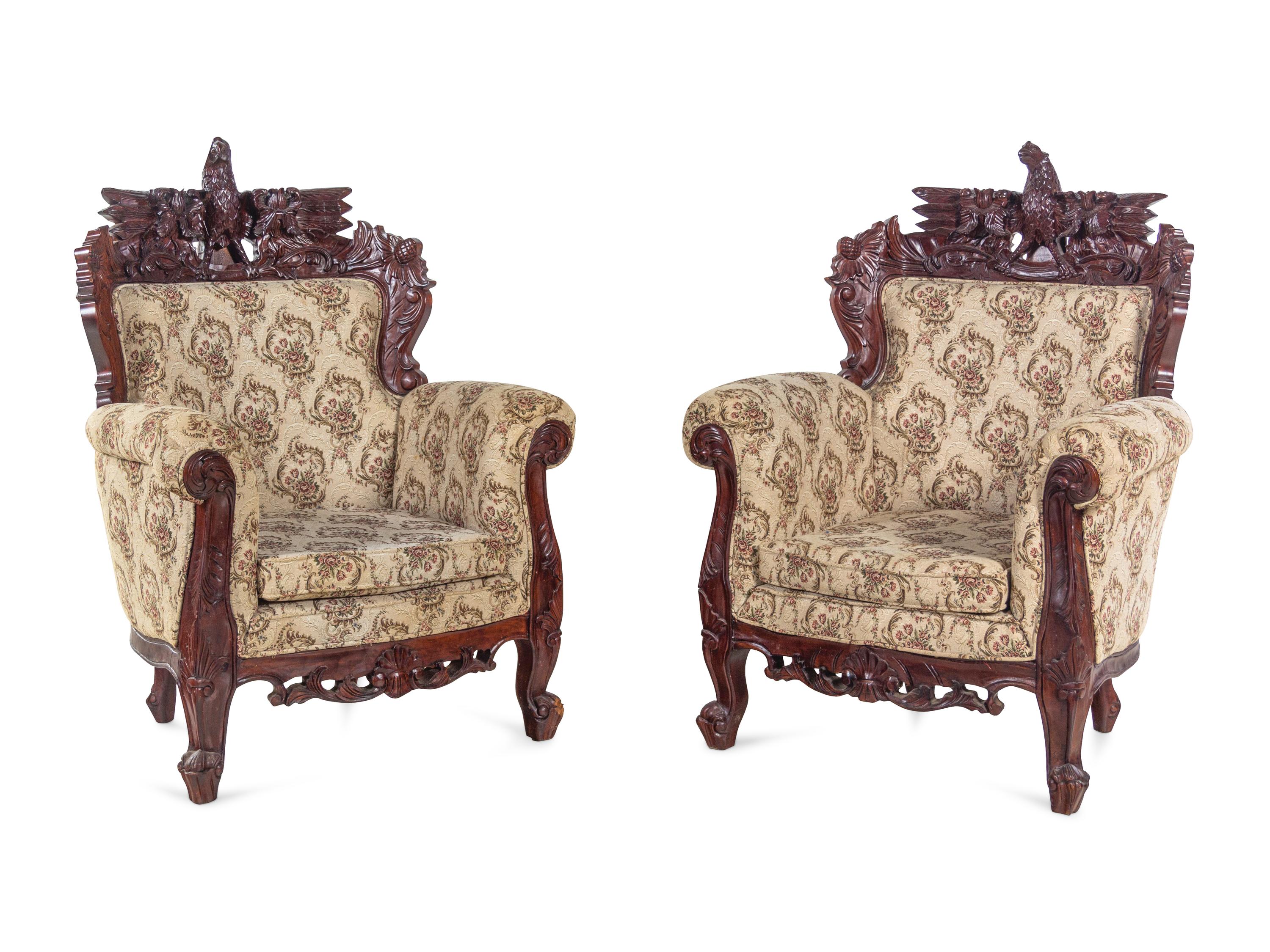 A Pair of Anglo-Colonial Style Carved Mahogany Armchairs