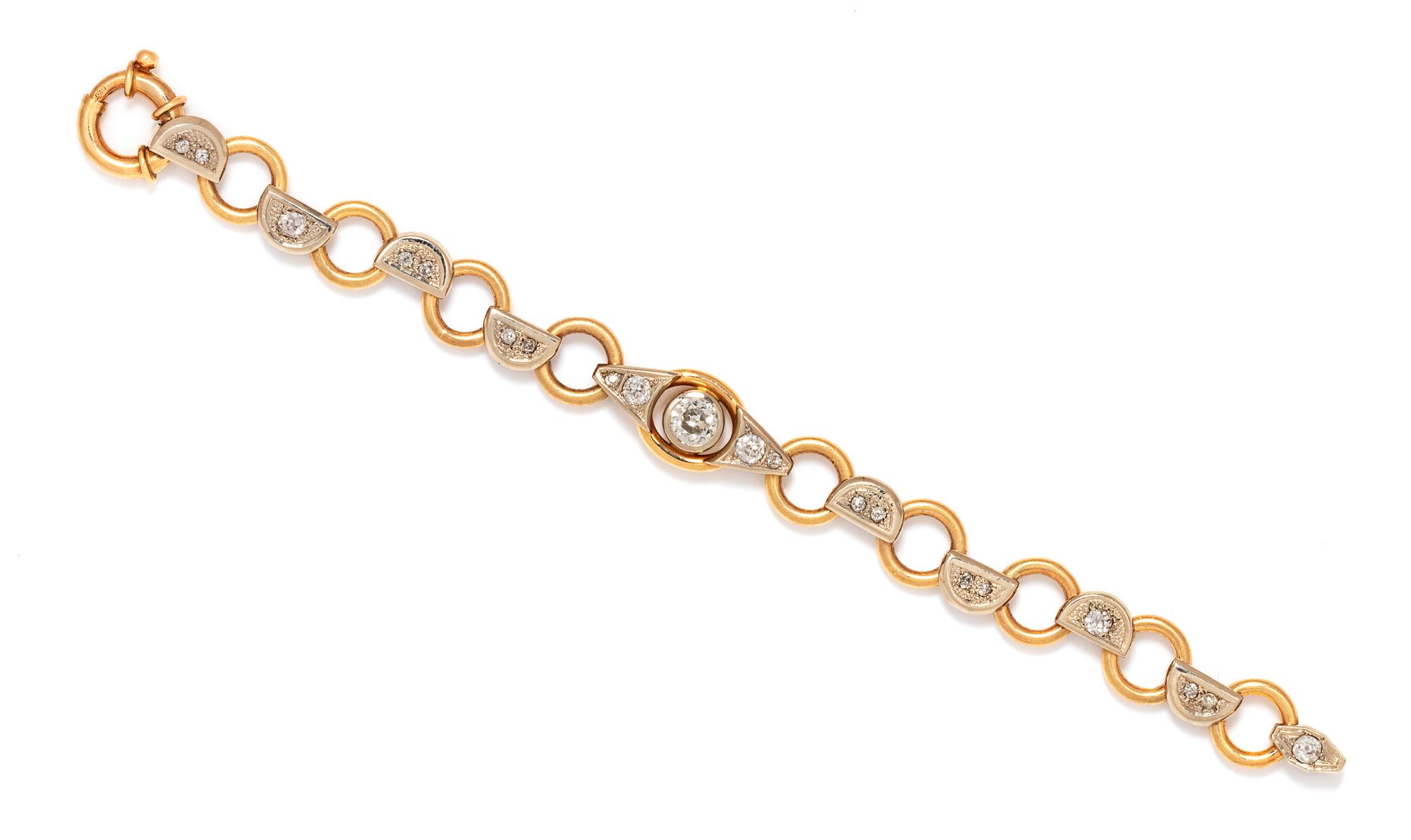 A Retro 14 Karat Bicolor Gold and Diamond Bracelet, 16.95 dwts.