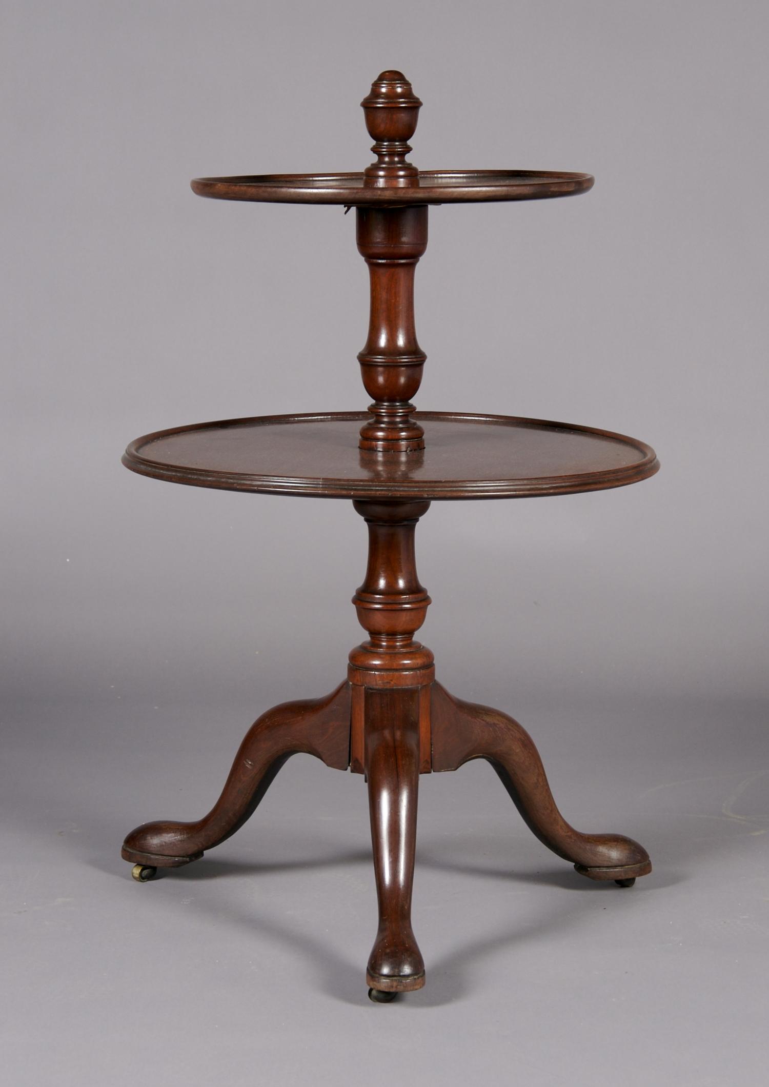 An English Mahogany Two-Tiered Dumb Waiter, Height 38 inches.