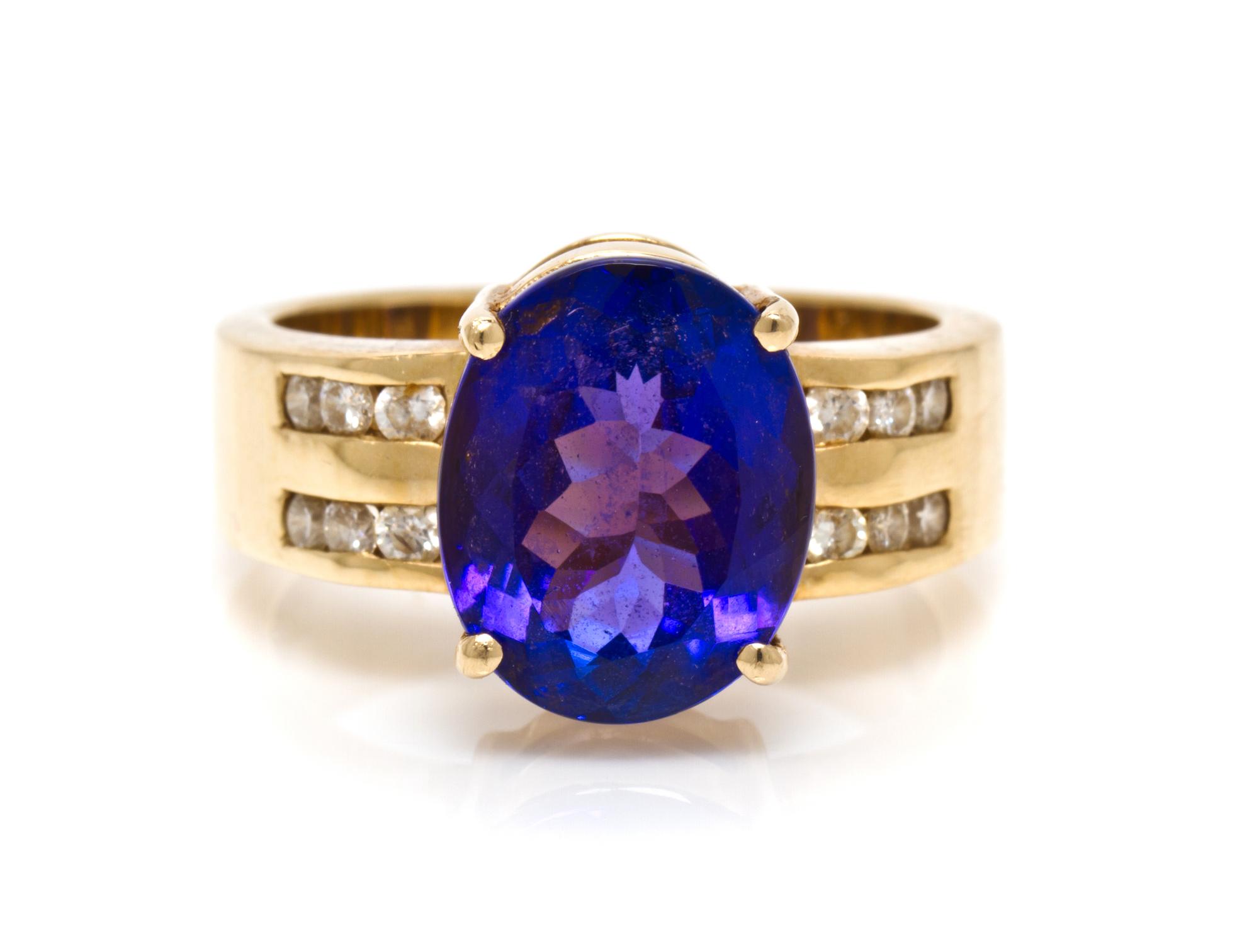 A 14 Karat Yellow Gold, Tanzanite and Diamond Ring, 7.30 dwts.