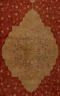 An Indo-Tabriz Wool Rug
