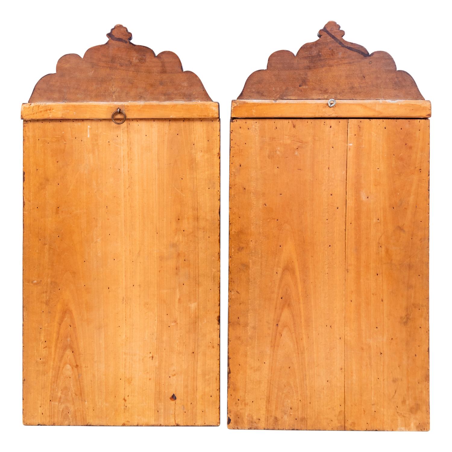 A Pair of Persian Carved Walnut Mirrors