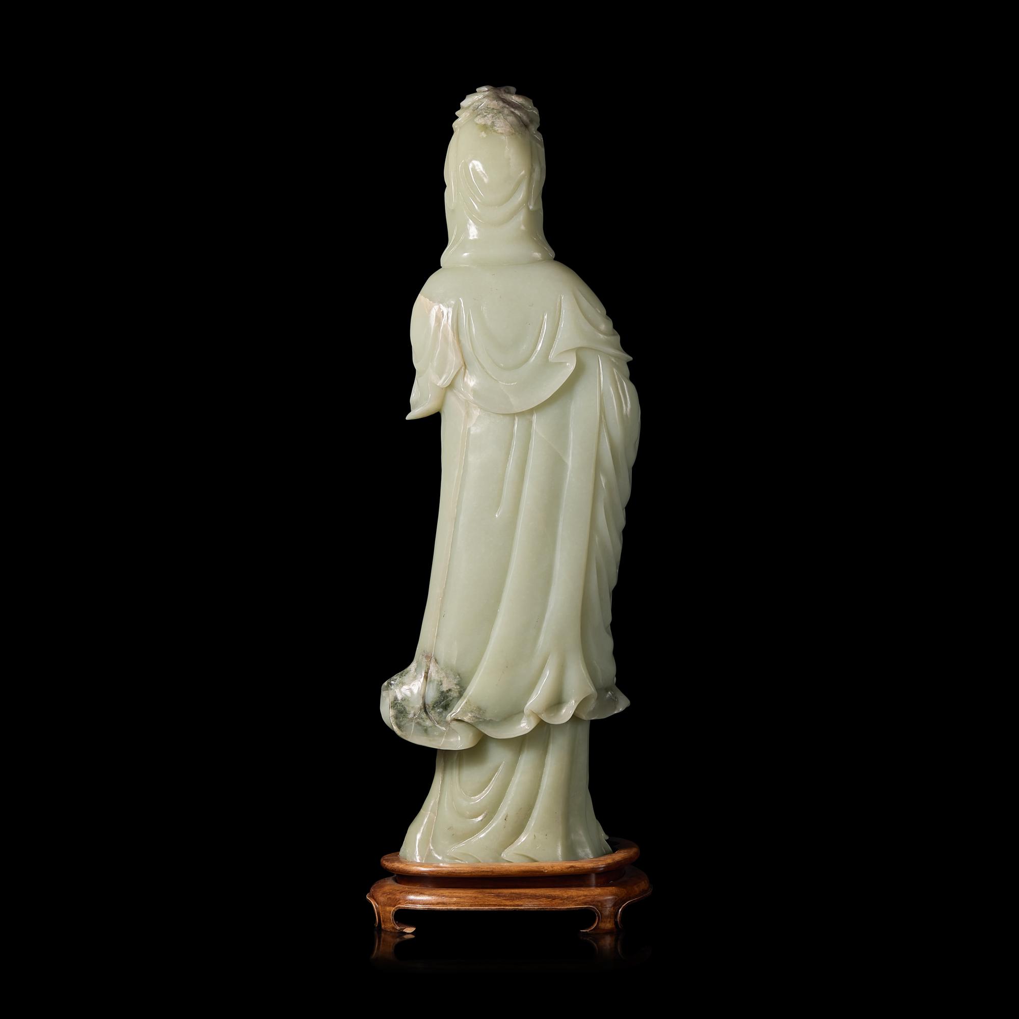 A Large Chinese Pale-Celadon Jade Guanyin, 20th Century 近代 青白玉大觀音像