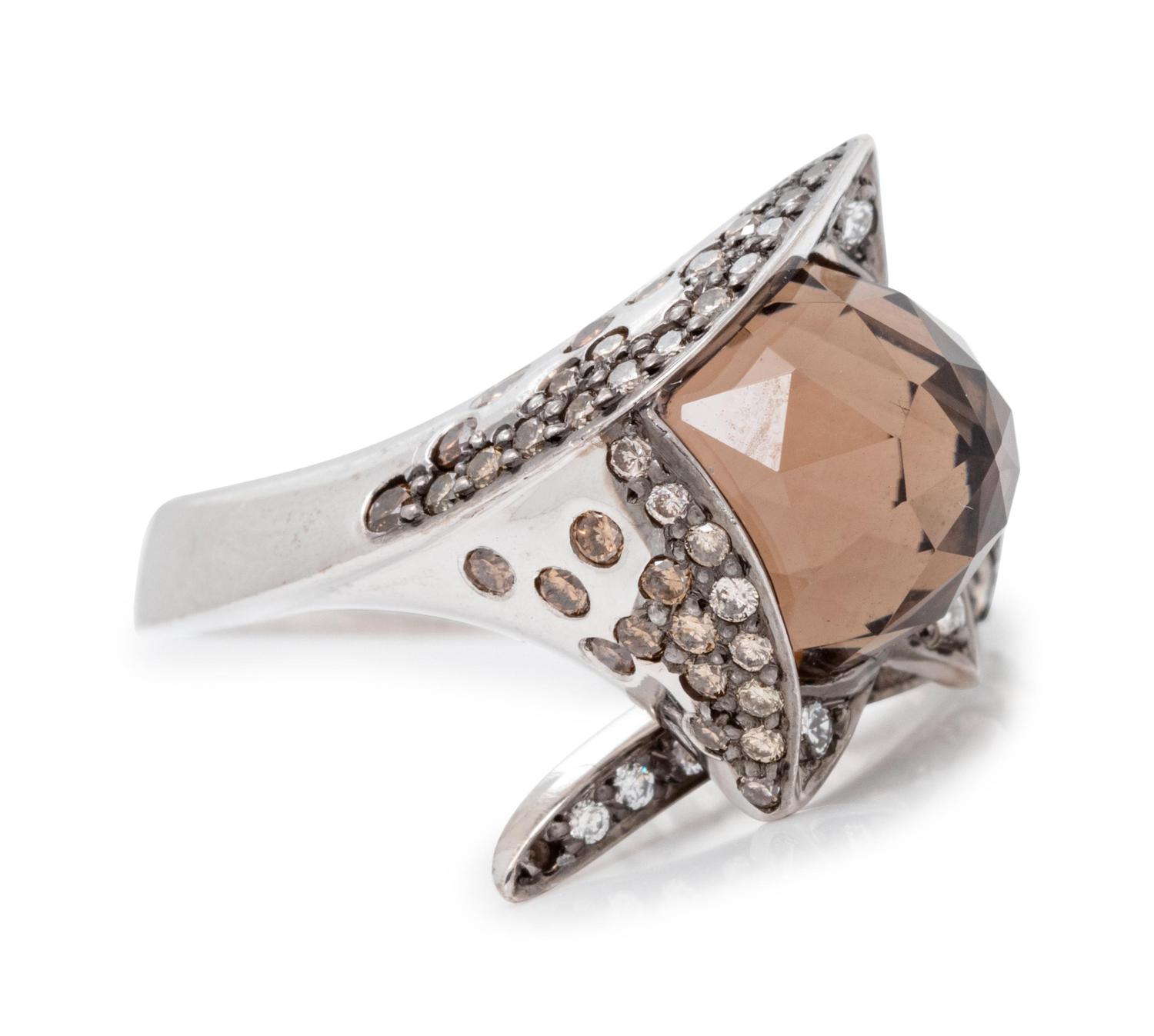 An 18 Karat White Gold, Smoky Quartz, Diamond and Colored Diamond Ring,