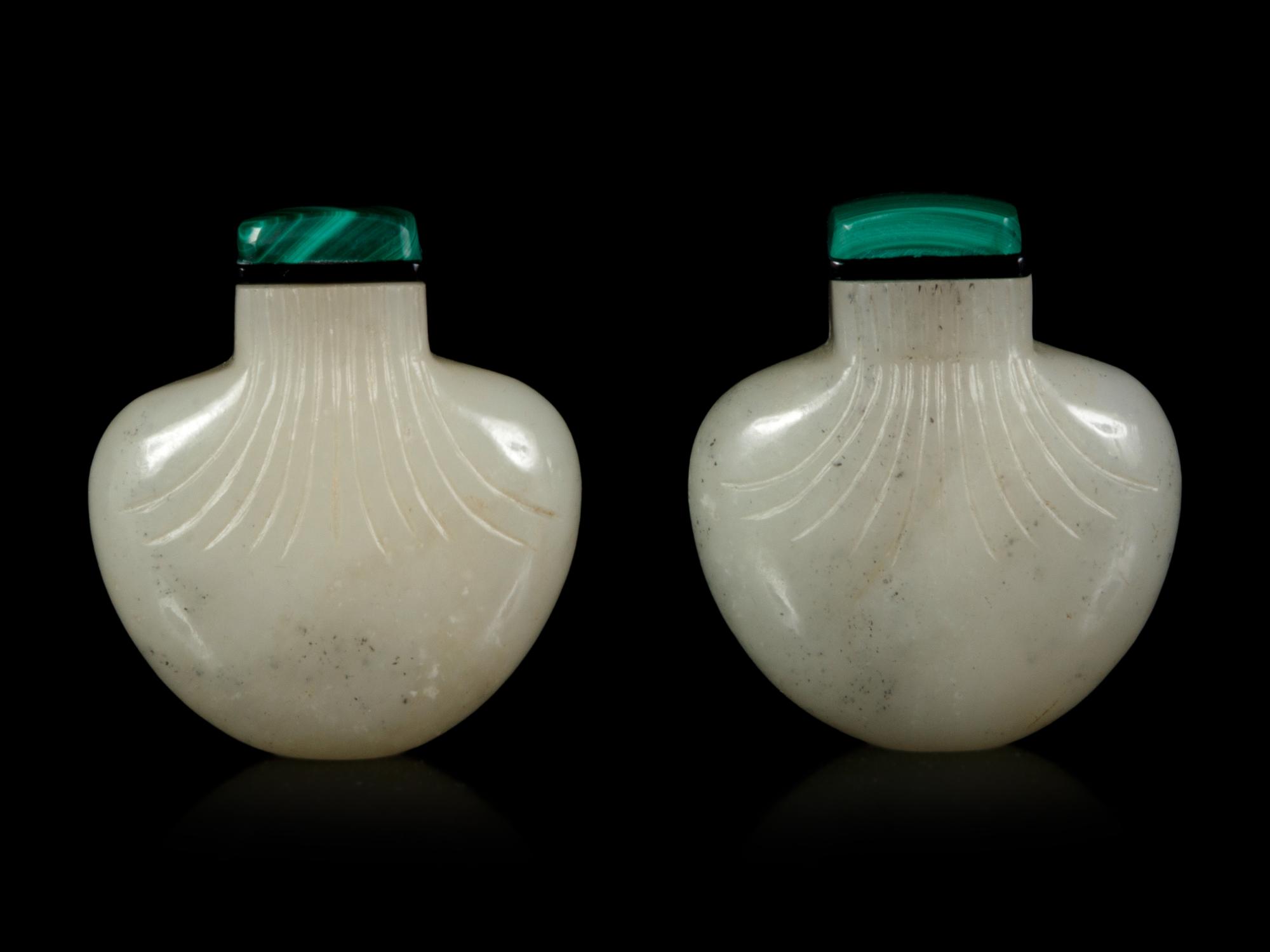 A Pair of White Jade Purse-Form Snuff Bottles