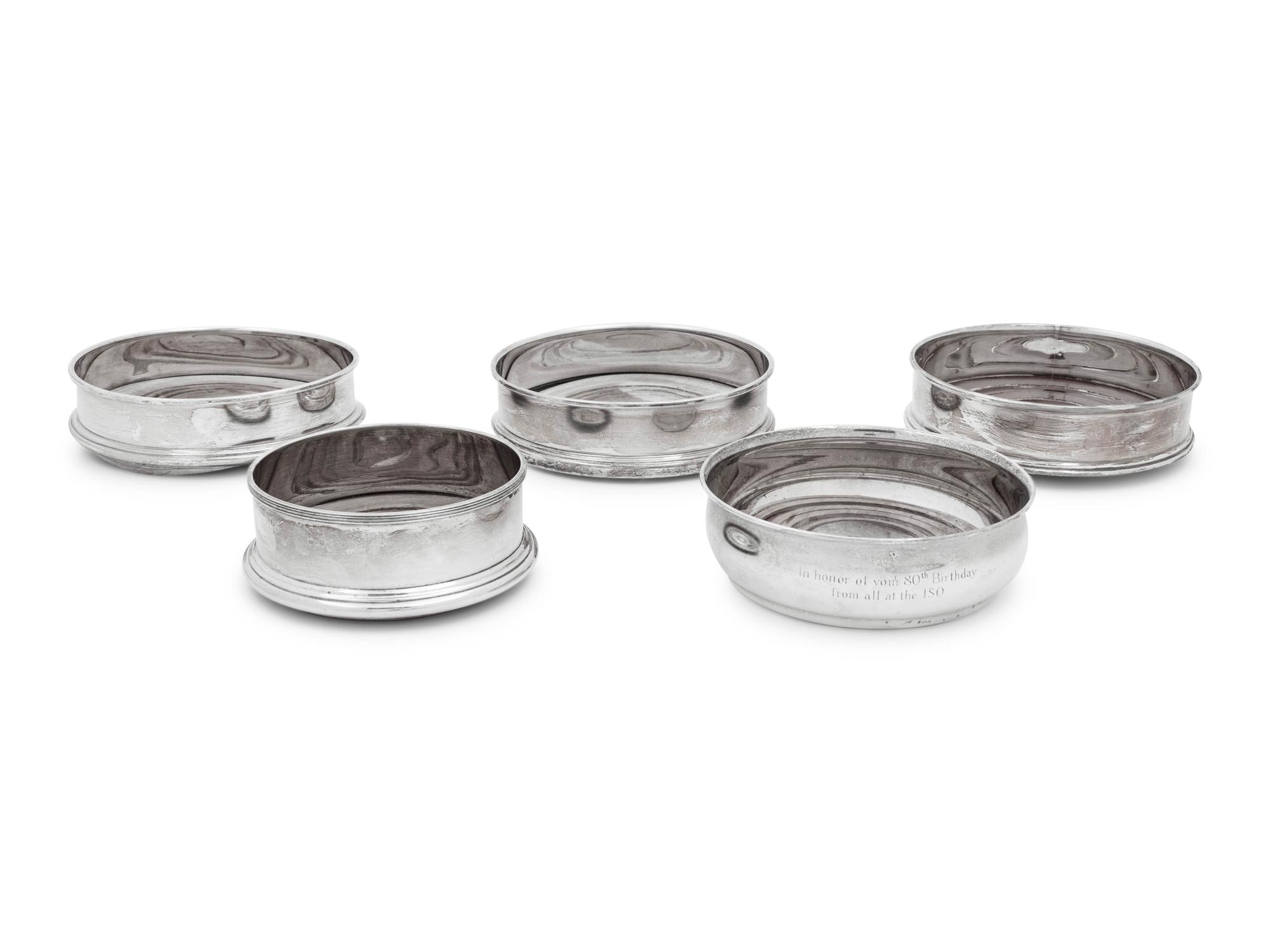Four Elizabeth II Silver Wine Coasters