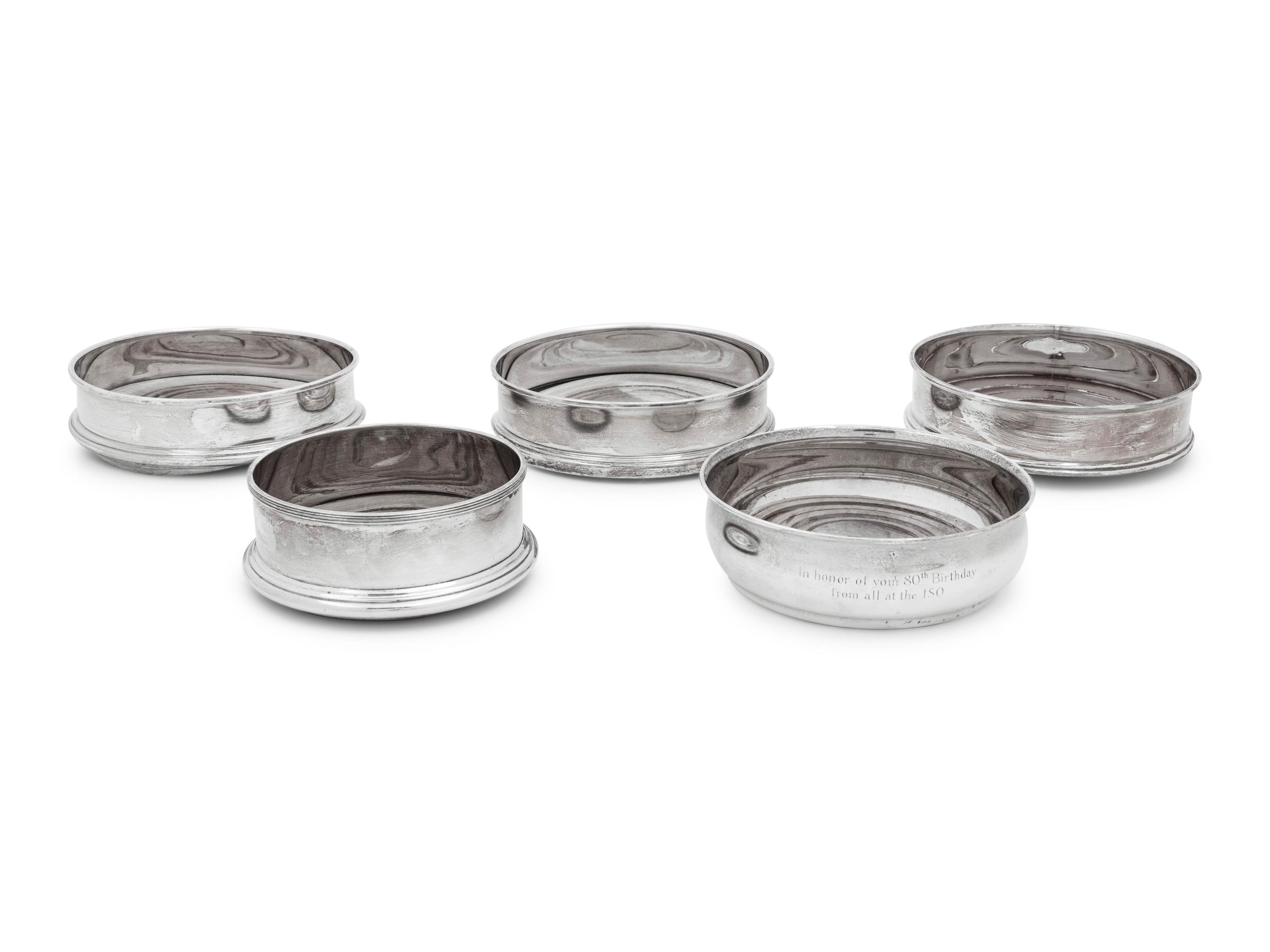 Four Elizabeth II Silver Wine Coasters