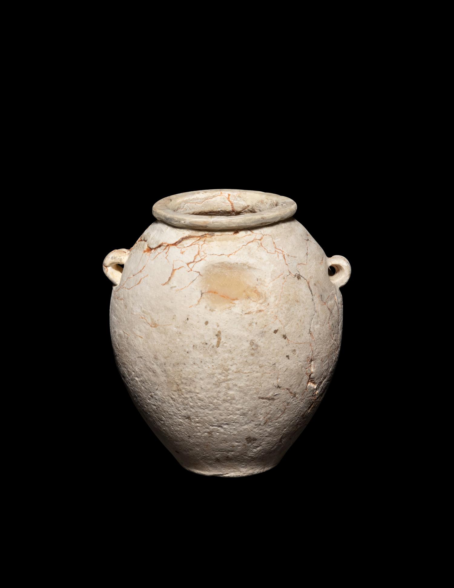 An Egyptian Miniature Limestone Lug Handled Jar