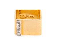 A 14 Karat Yellow Gold and Diamond Ring,