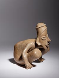 A Jalisco Pottery Crouching Figure