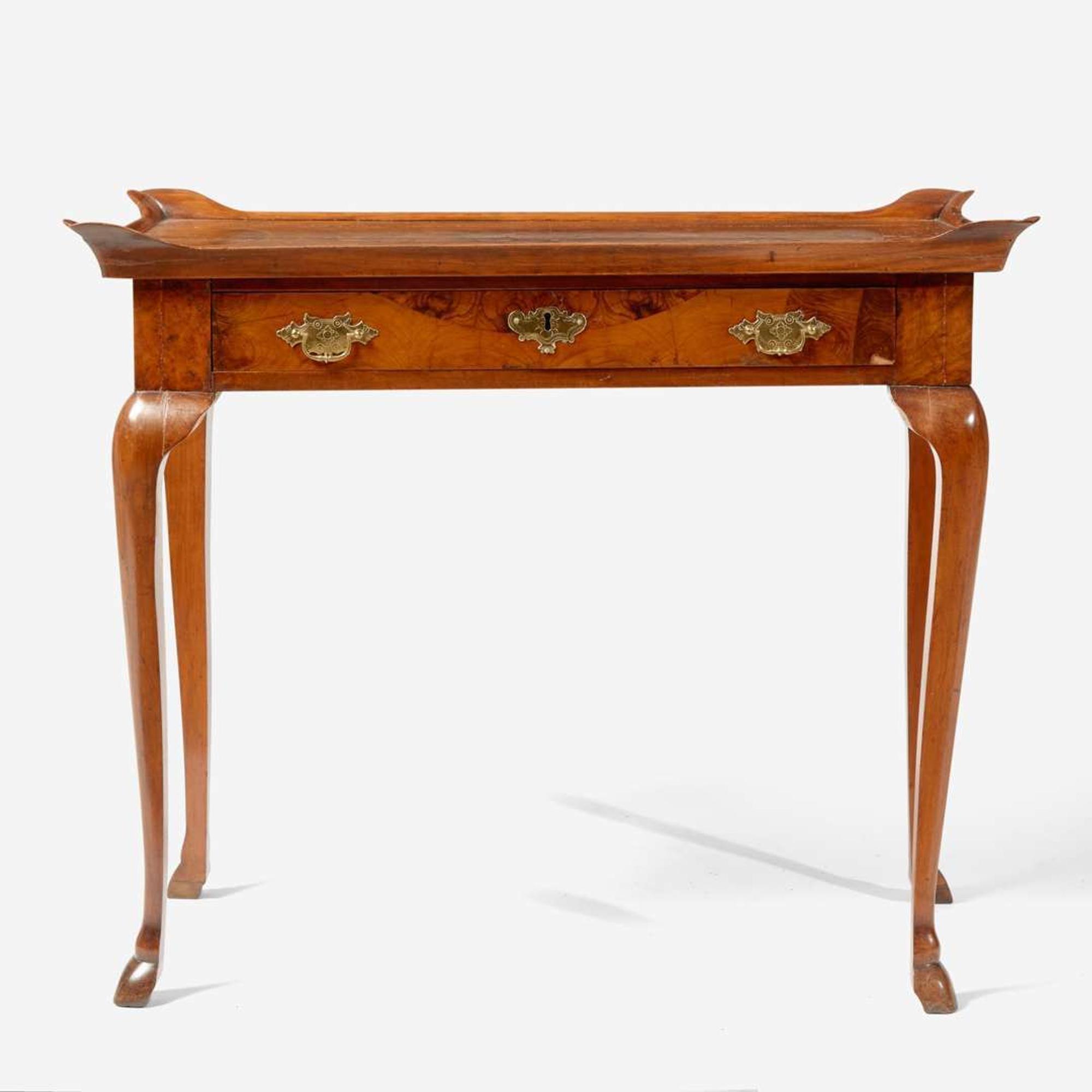 A Queen Anne burl walnut and oyster veneered dressing table early 18th century and later