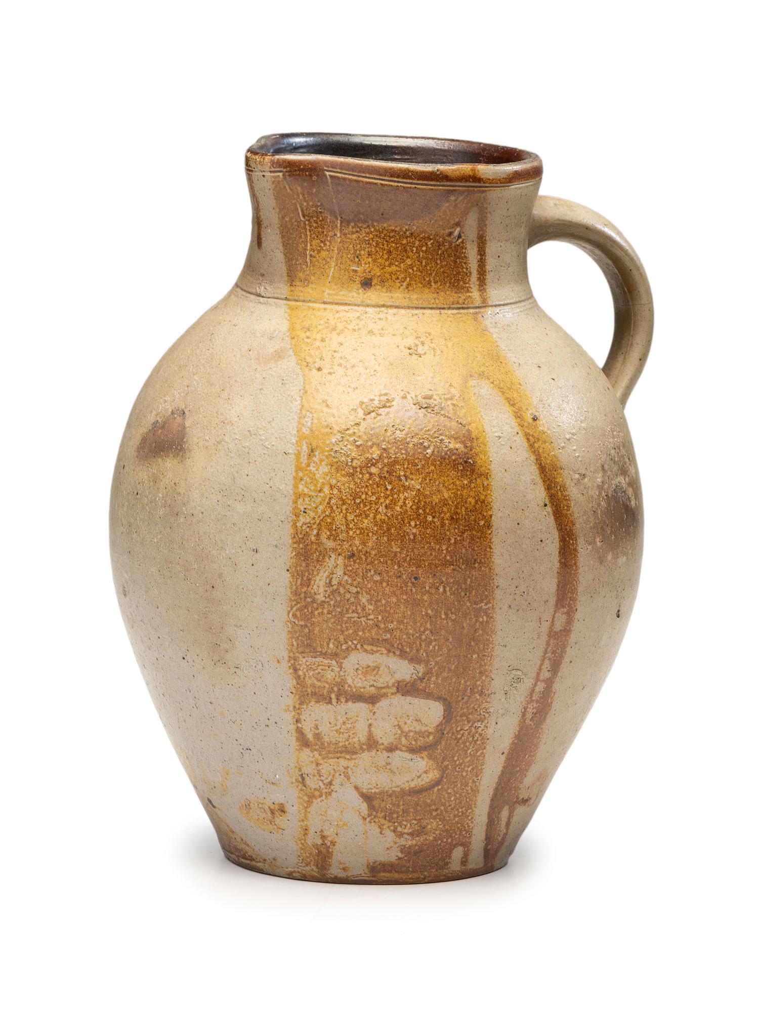 A Slip-Glazed Stoneware Pitcher