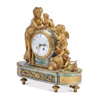 A Louis XVI Style Gilt-Bronze Mounted Green Onyx Figural Mantel Clock