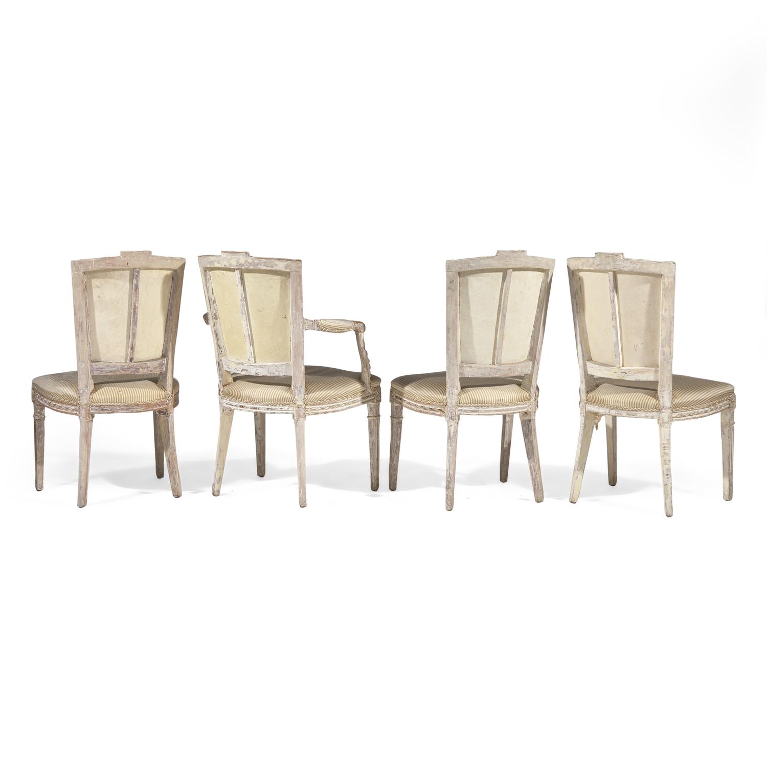 A Set of Four Louis XVI Carved and Painted Dining Chairs