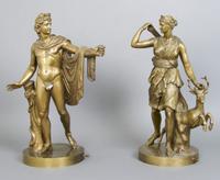 A Pair of Bronze Figures, Height overall 18 1/2 inches.