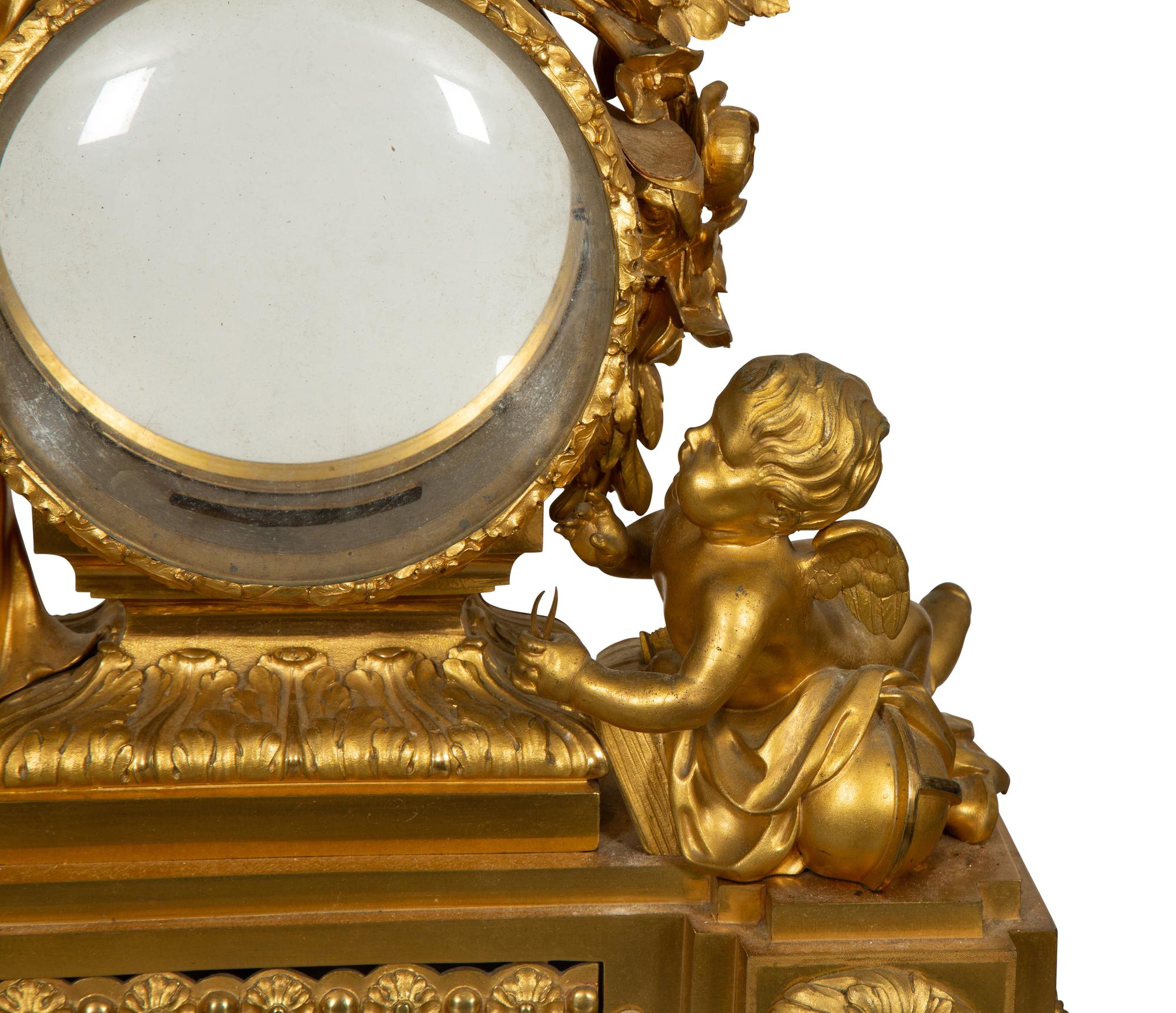 A Louis XVI Gilt Bronze Mounted Marble Mantel Clock