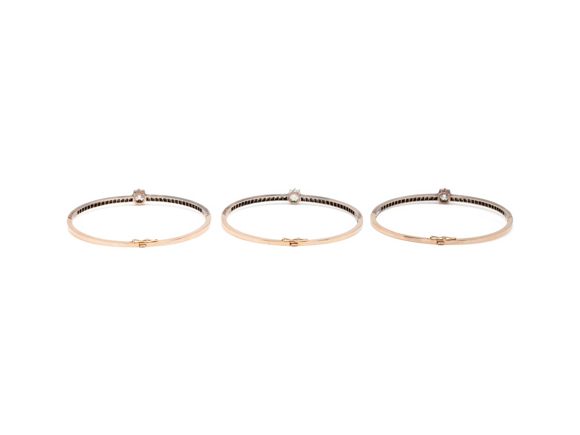 THREE ANTIQUE DIAMOND BANGLE BRACELETS