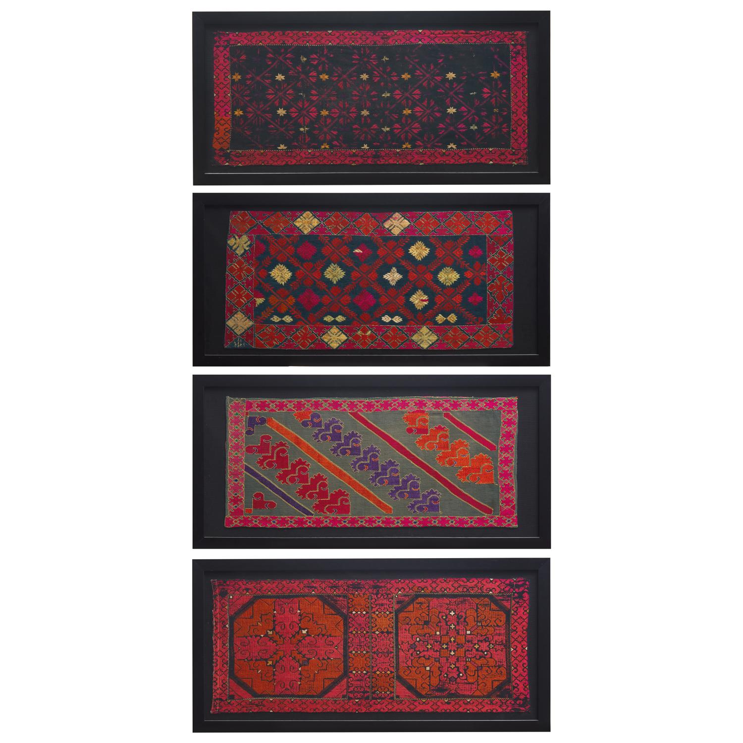 A Group of Four Framed Textiles