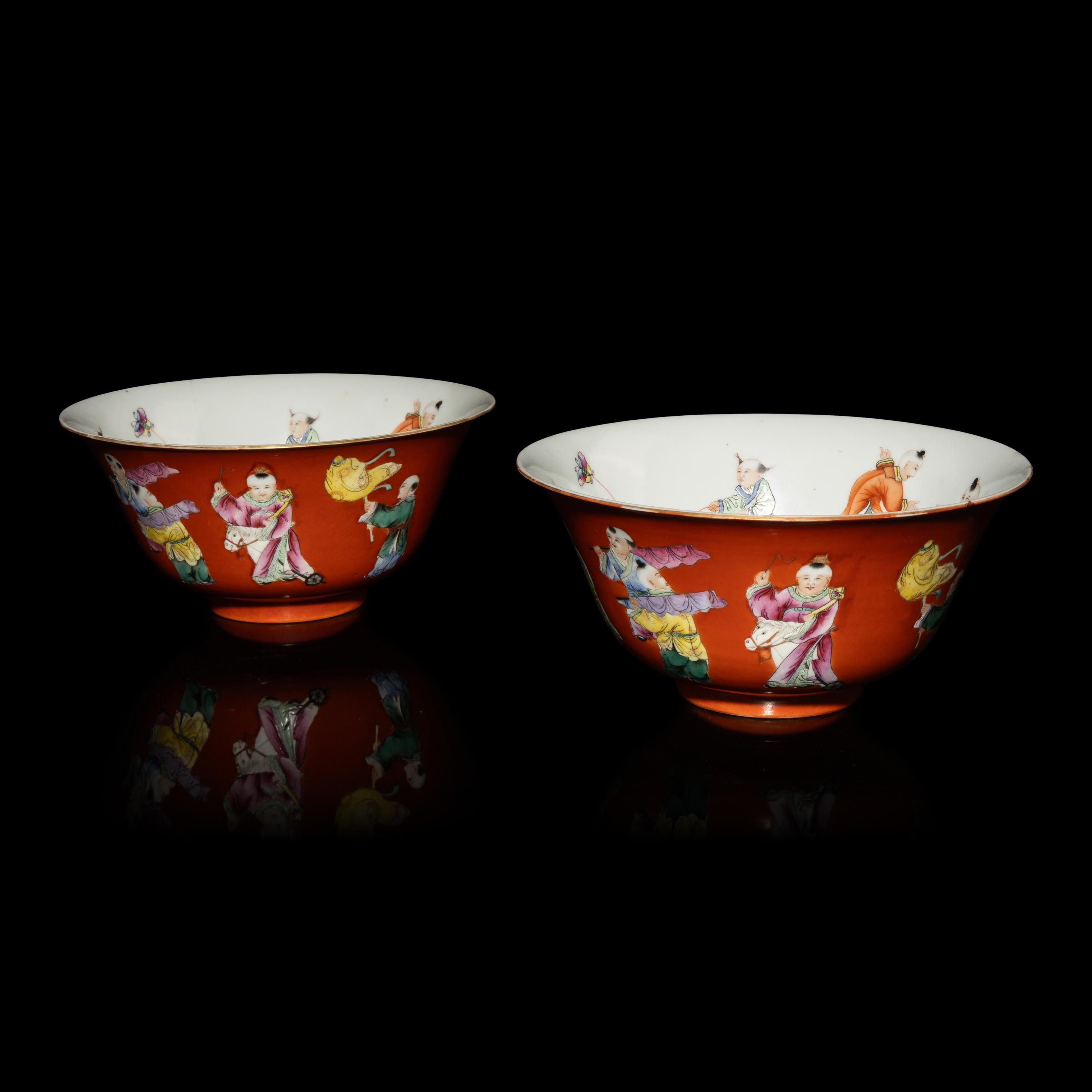 A Pair of Chinese Coral-Red Ground Famille Rose Porcelain Bowls, Late 19th-20th Century — 清晚期 珊瑚紅地粉彩童子圖碗一對