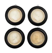 A Set of Four Grand Tour Plaster Portrait Medallions of Italian Poets
