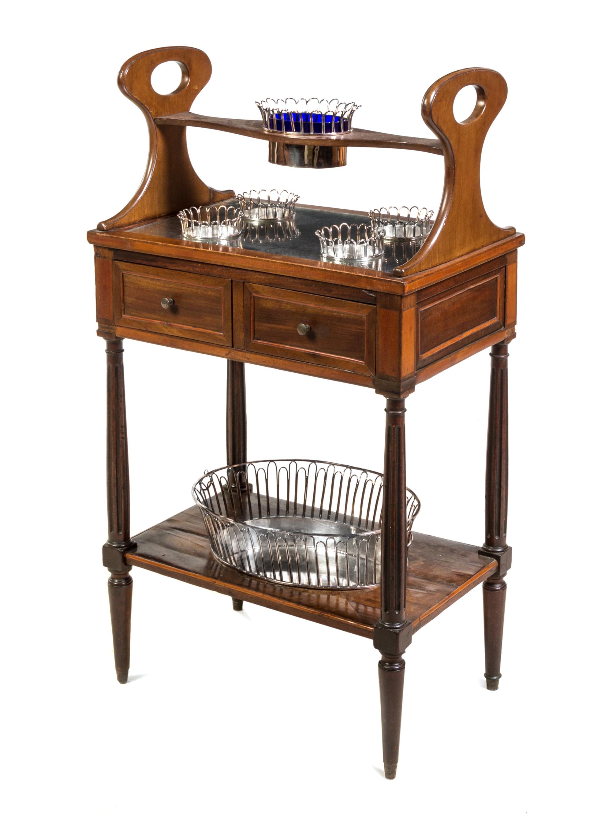 An English Silver-Plate and Mahogany Serving Stand Height 37 3/4 x width 21 x depth 13 5/8 inches. — FIRST HALF 20TH CENTURY