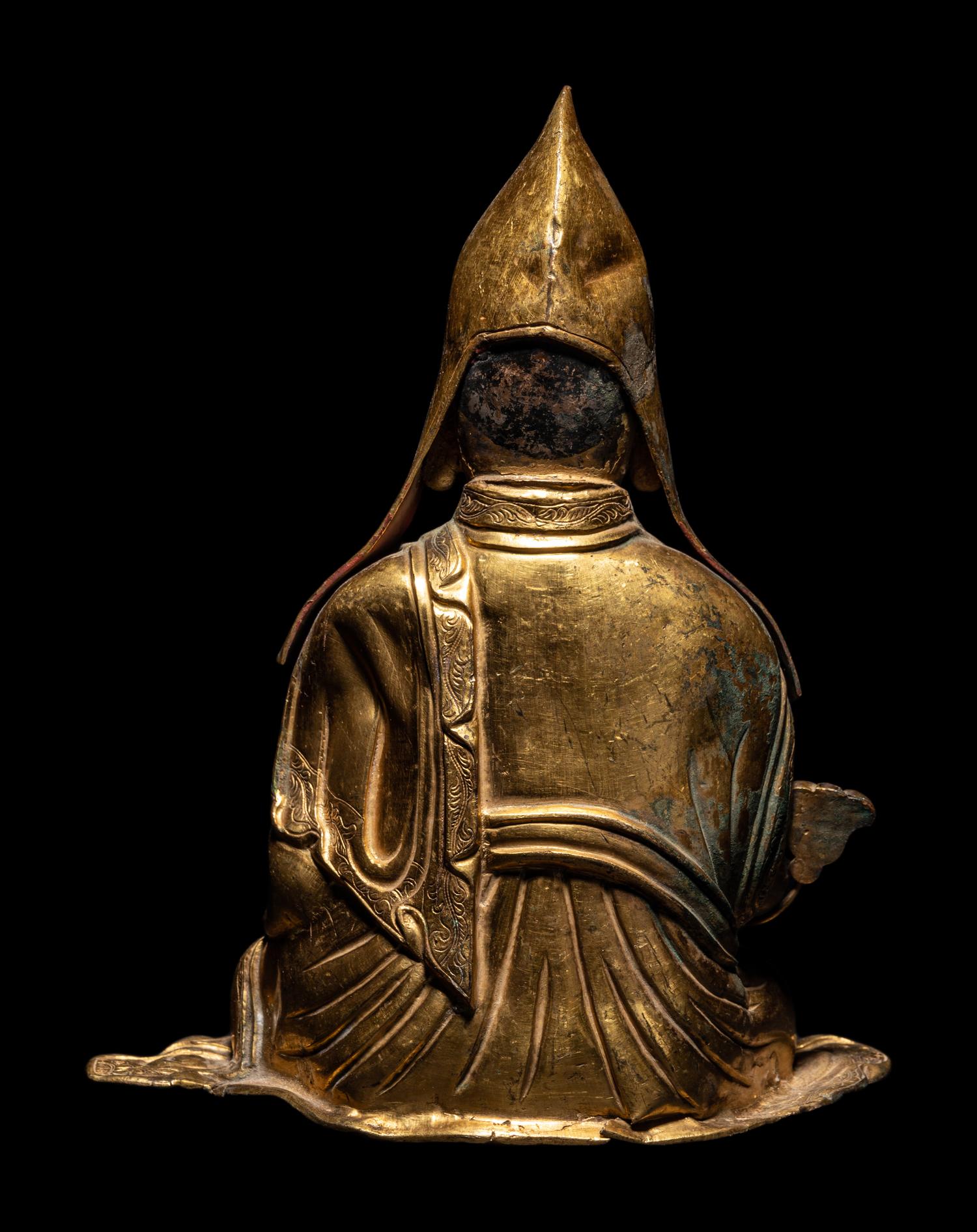 A Tibetan Gilt Bronze Repoussé Seated Figure of Tsongkhapa