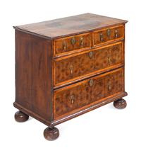 A William and Mary Oysterwood and Figured Walnut Chest of Drawers