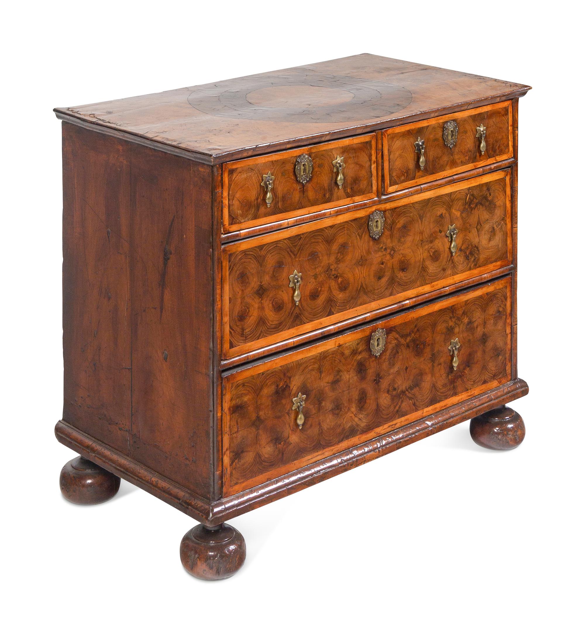 A William and Mary Oysterwood and Figured Walnut Chest of Drawers